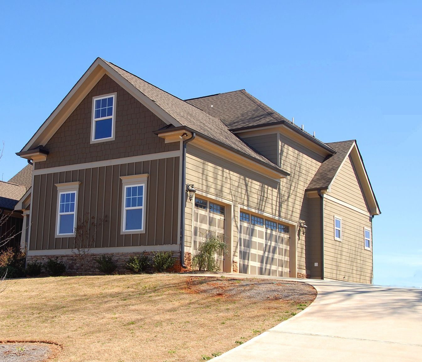 A sun-baked suburban house with almost no shade